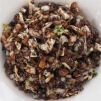 Gan Jjajang · Minced pork, onion, zucchini, shiitake, green cabbage. 
Contains shellfish, soy, wheat.