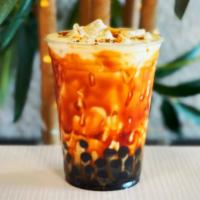Tiger Coffee Latte (ice) · Love the caramelized taste of brown sugar?   Try our coffee with brown sugar boba, organic m...