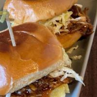 BBQ Pork Sliders · 3 Sliders slow cooked Braised Pork tossed in Barbecue Sauce and Coleslaw.