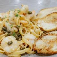 Shrimp Scampi Pasta · Marinated Garlic Shrimp with Linguini Pasta Tossed with Scampi Sauce.