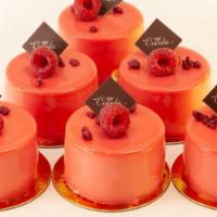 Baccara (Raspberry & White Chocolate Mousse) · Raspberry compote and spice cream on almond sponge and white chocolate mousse.