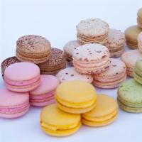 Mini French Macaron · Almond based egg white cookies; assorted traditional flavors, pistachio, raspberry, mango pa...