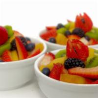 Fruit Salad · Freshly cut berries and melons.