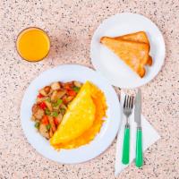 Cheese Omelette · Three egg omelette with gooey melted cheddar and swiss cheesse, served with buttered toast a...