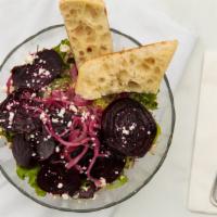 Beet Salad · Roasted beets with seasonal lettuces, feta cheese, pickled red onions, toasted pecans and gi...