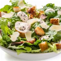 The Caesar Salad · Fresh salad made with romaine lettuce, grape tomatoes, and shaved parmesan cheese topped wit...