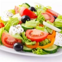 The Greek Salad · Fresh salad made with mixed greens, feta cheese, Kalamata olives, sliced tomatoes, cucumbers...