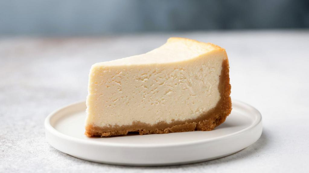Cheesecake · A slice of creamy, rich NY-style cheesecake.