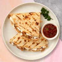 Eve's Veggie Quesadilla · Mix of veggies with cheese and salsa. Upgrade your quesadilla by adding cheese, guacamole, s...