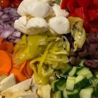 Chopped Veggie (Family) · Hearts of romaine, red bell peppers, tomatoes, cucumber, fennel, onion, fresh mozzarella, ar...