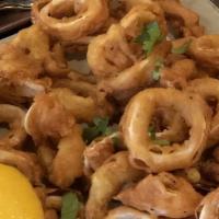 Calamari · Calamari dipped in a chickpea batter and fried. Gluten-free.