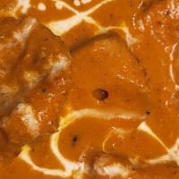 Chicken Tikka Masala Curry · Boneless chicken tikka simmered in a tomato and cream base sauce with butter and mild spices.