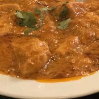 Murgh Makhani Curry (Butter Chicken) · Boneless chicken simmered in a spiced creamy tomato and butter sauce.