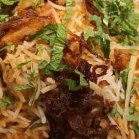 Chicken Biryani · Boneless chicken with basmati rice and spices.