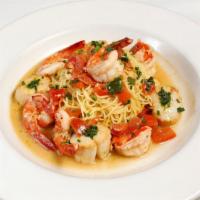 Shrimp & Scallop Scampi · Shrimp and scallops in butter, lemon and garlic sauce over angel hair pasta.