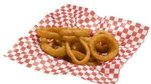Jumbo Onion Rings · A huge pile of sweet onion rings dipped in beer batter and fried golden brown and served wit...