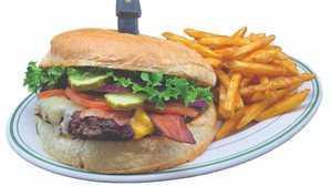 The 1 Pound Redwood Burger · One full pound Burger with swiss and american cheese, topped off with three strips of bacon, lettuce, tomato, red onions, pickles and our special dressing on a grilled bun.