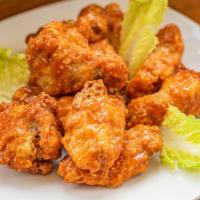 5 pieces Wings · Choice of parmesan, garlic, BBQ, lemon pepper, buffalo, spicy 
. Served with ranch sauce.