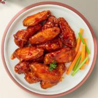 Buffed Buffalo Wings · Breaded and deep-fried chicken wings fried until golden brown before being tossed in buffalo...
