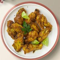 Crazy Curry Wings · Breaded and deep-fried chicken wings fried until golden brown before being tossed in curry s...