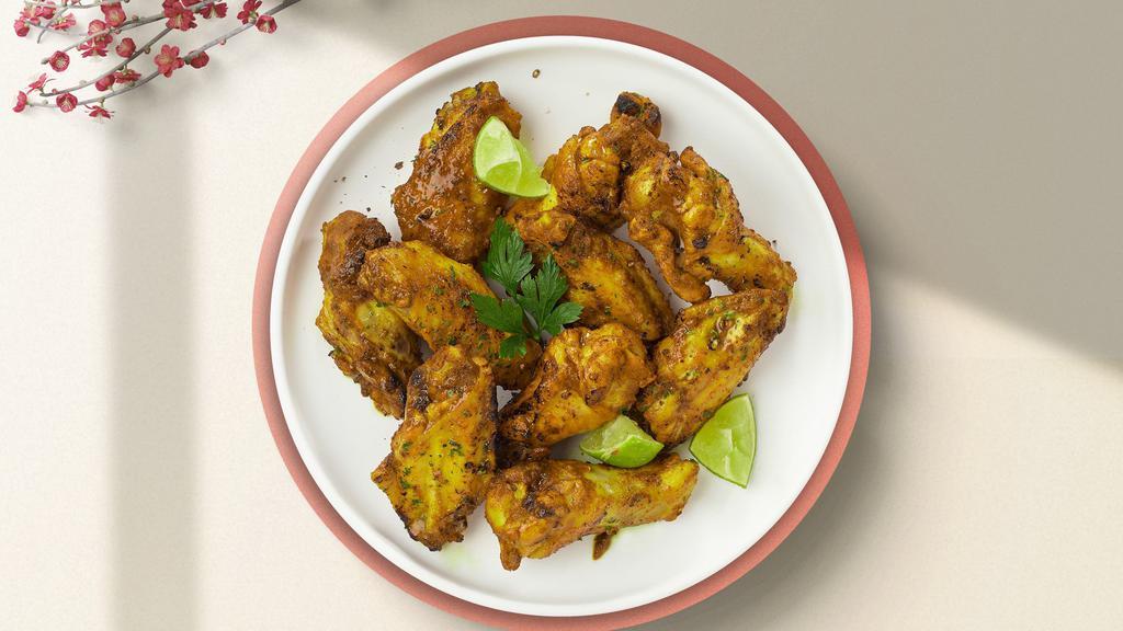 Crazy Curry Wings · Breaded and deep-fried chicken wings fried until golden brown before being tossed in curry sauce.