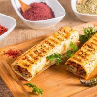 Kofta Gyro Sandwich · Seasoned ground beef with turkish spices and herbs.