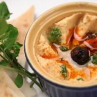 Hummus (8oz) · Served with pita bread. Mashed chickpeas, mixed with fresh lemon juice, minced garlic, olive...