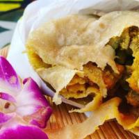 Vegan Roti · Dhalpourie Roti Skin filled with Curry potatoes, chana (aka chickpeas or garbanzo beans), an...
