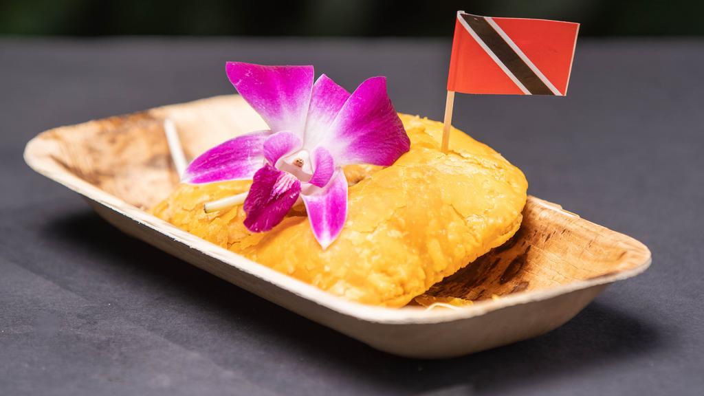 Jamaican Patties · An empanada style flaky pastry filled with spicy beef, veggies, or curry chicken.
Vegan option.