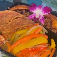 Chef Ann's Special: Whole Fried Tilapia with Creole Rice · Whole Fried Tilapia, Sautéed Vegetables, Creole Rice( red beans and rice) , and Plantains. C...