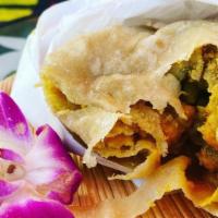 Curry Goat Roti · Dhalpourie Roti Skin filled with Curry Goat, potatoes, and chana (aka chickpeas or garbanzo ...