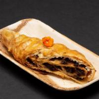 Currants Roll · A sweet pastry filled with currants spiced with allspice & cinnamon rolled up in flaky puff ...