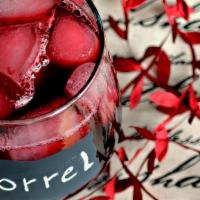 Cocobreeze Red Wine Sorrel Sangria  · This island thirst quencher is tart, sweet, citrusy, boozy, with fruity pear, pomegranate an...