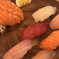 Sashimi Appetizer (6 pc) · tuna salmon yellowtail.