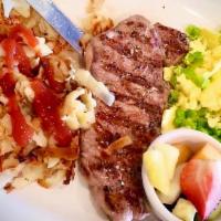 Steak and Eggs · USDA New York Steak Flame grilled with 2 eggs any style. Served with potatoes and a toasted ...