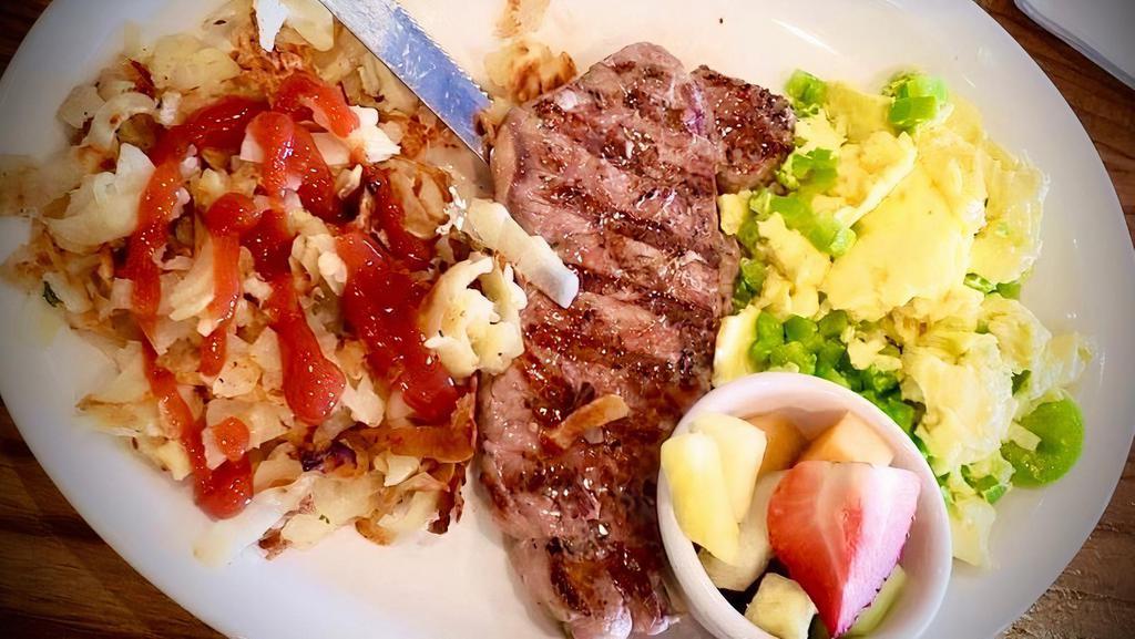 Steak and Eggs · USDA New York Steak Flame grilled with 2 eggs any style. Served with potatoes and a toasted bagel.