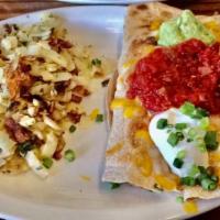 GF- South of the Border · 2 -corn tortillas filled with 3 scrambled eggs, chorizo, mushrooms, onions, green chilies, a...