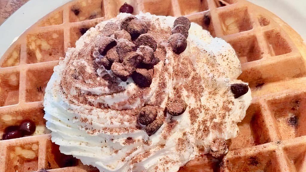 GF - Chocolate Divine Waffle · Filled with semi-sweet chocolate chips, topped with fresh whipped cream and ground Ghirardelli® chocolate.