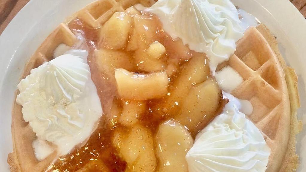 GF - Apple Waffle · Topped with apples in a hot cinnamon glaze with fresh whipped cream.
