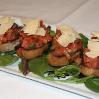 Bruschetta · Diced tomatoes mixed with basil, garlic, capers, served over grilled slices of bread with sh...