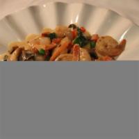 Gamberetti · Shrimps sautéed with mushroom, zucchini, carrots, basil, lemon white wine sauce.