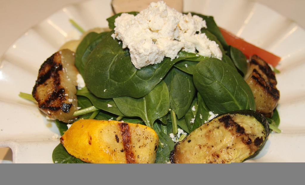 Insalata Spinaci · Fresh spinach with grilled eggplant and zucchini, bell pepper, artichoke, feta cheese, egg, and house dressing.
