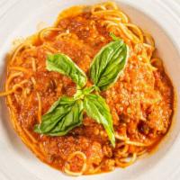 Spaghetti Bolognese · Pasta with meat sauce.