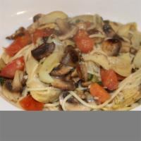 Spaghetti Alla Carciofo · Pasta with artichokes, mushrooms, fresh tomato in white wine sauce