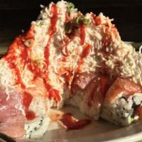 37. Number 1 Roll · Spicy. Shrimp tempura, crab, avocado, cucumber wrapped with tuna and salmon topped with crab...