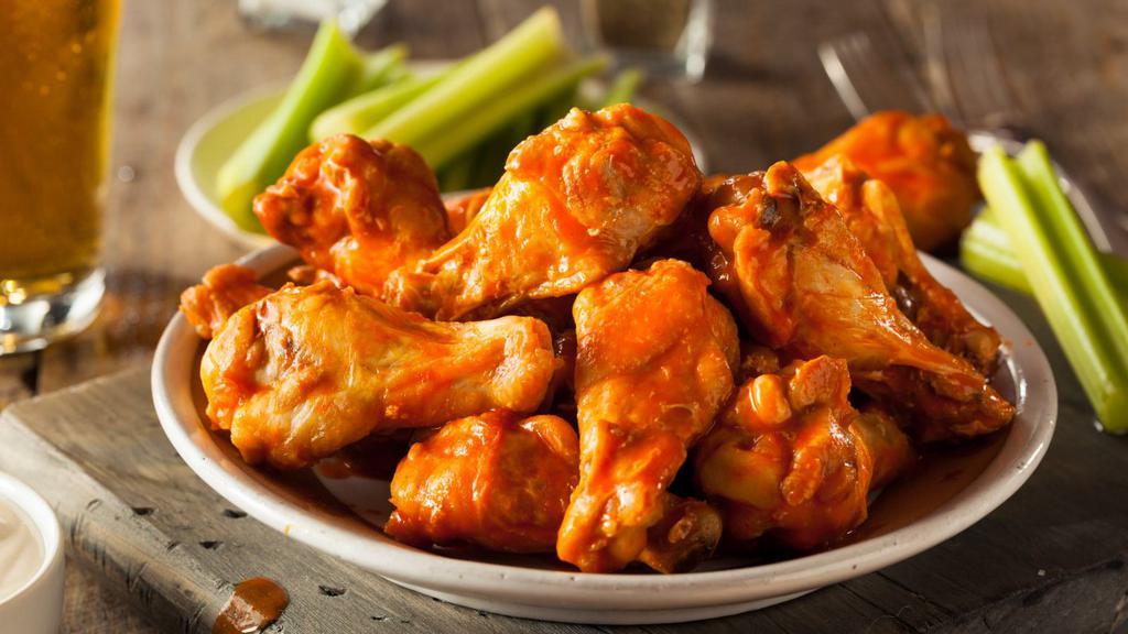 Hot Chicken Wings · Hot and spicy chicken wings served with a side of ranch dressing.