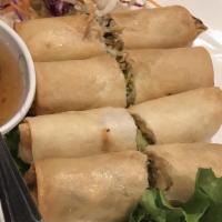 Vegetarian Egg Rolls · Deep-fried rolls stuffed with cabbage and bean thread.