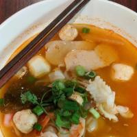 Tom Yum · Hot and sour soup with your choice of meat, galangal, mushrooms, lemongrass, tomatoes and on...