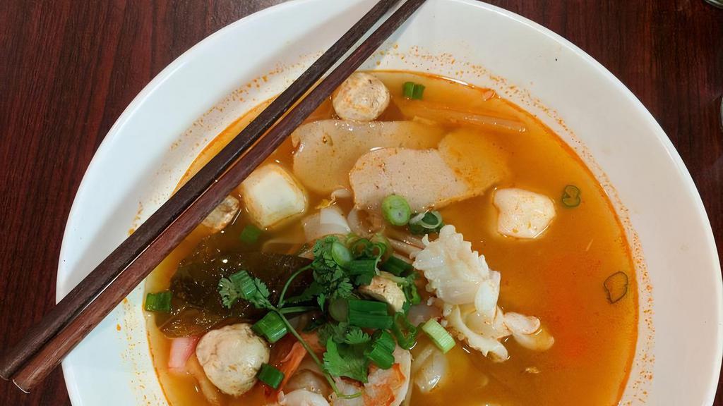 Tom Yum · Hot and sour soup with your choice of meat, galangal, mushrooms, lemongrass, tomatoes and onions.