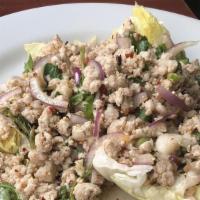 Larb · Choice of ground pork, beef or chicken tossed with red onions, green onions, and cilantro in...
